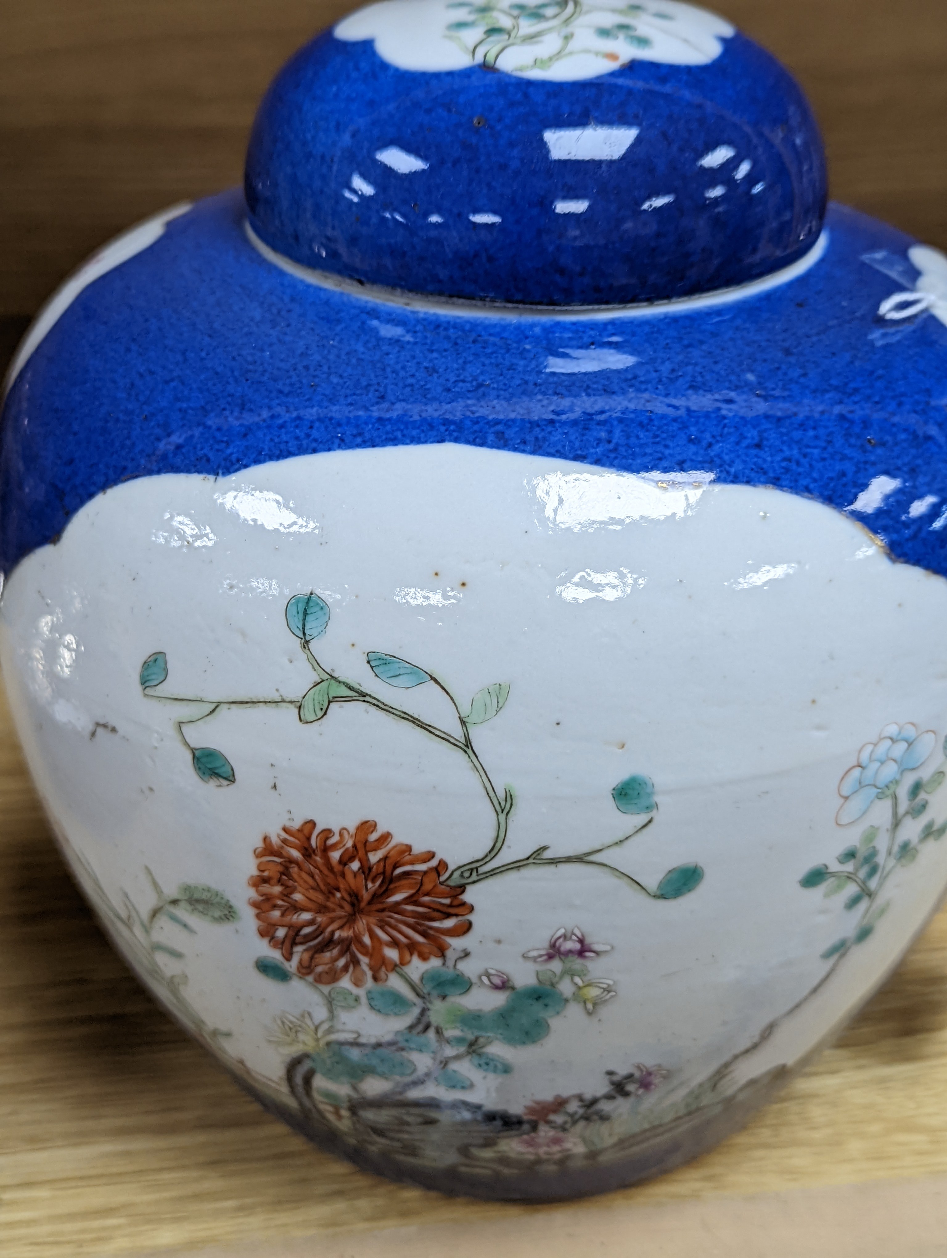 A Chinese blue ground jar and cover, 19th century, Qianlong mark to base, 20cm high